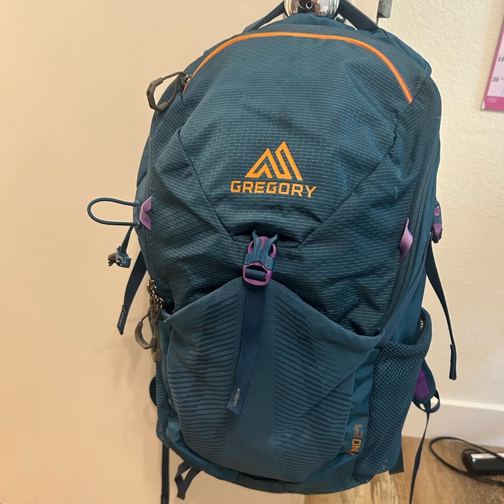 Gregory Nano 24 in teal with orange and purple accents
